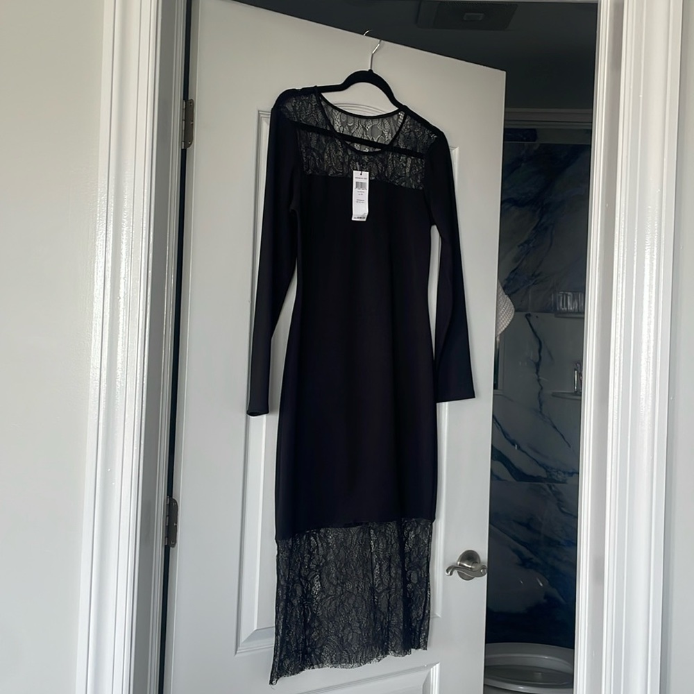 Black dress long sleeve lace top and also at the bottom